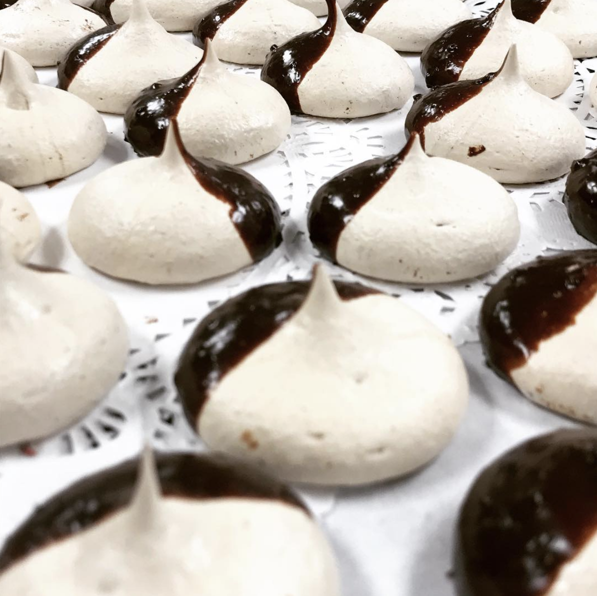 Photo of meringues dipped in chocolate