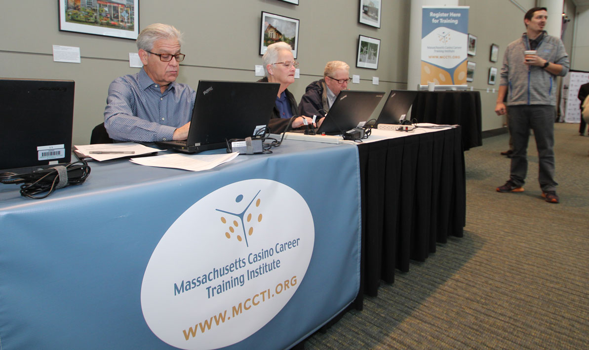 Prospective students register for classes during a launch event for the new MCCTI Gaming School in Springfield.