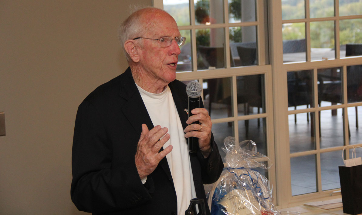 Former HCC president David Bartley pays tribute to Francis "Doc" Baker at the 30th annual HCC Foundation Golf Classic on Sept. 11. 