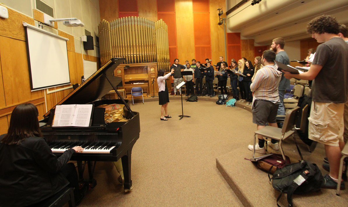 HCC music professor Ellen Cogen conducts the HCC College Chorale in preparation for the 50th anniversary concert of the Holyoke Civic Symphony Sunday, May 7.