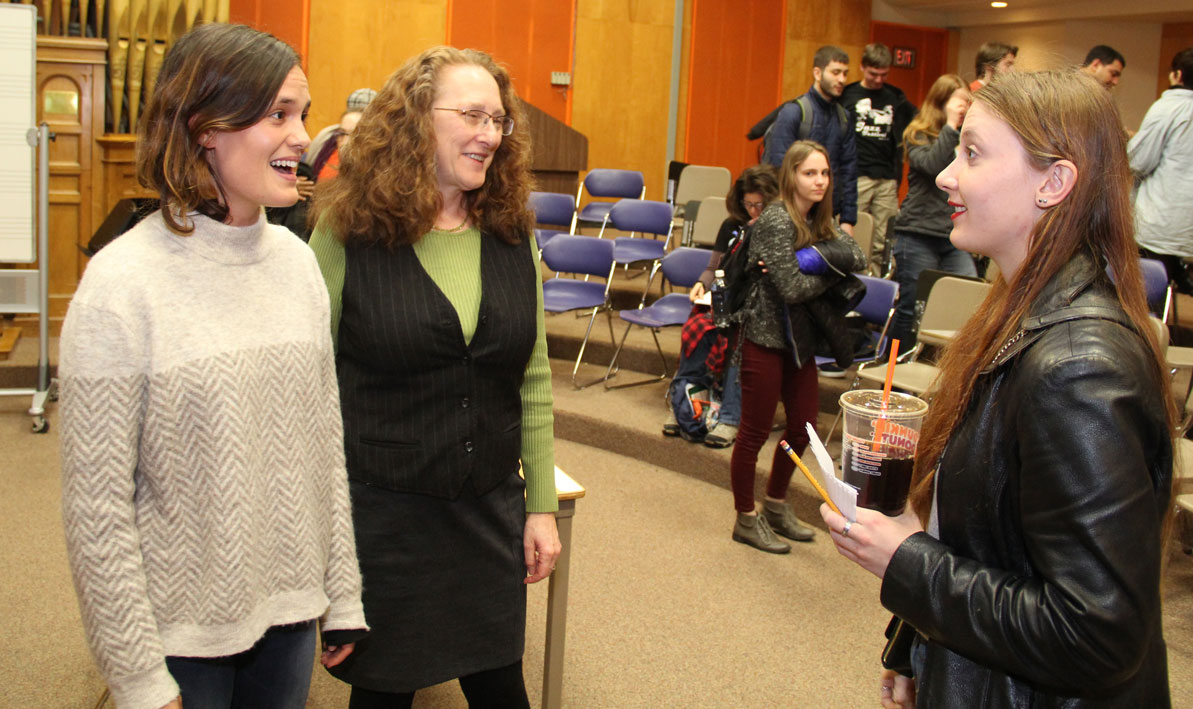 Kelly Zutrau meets with students after her guest talk at HCC.