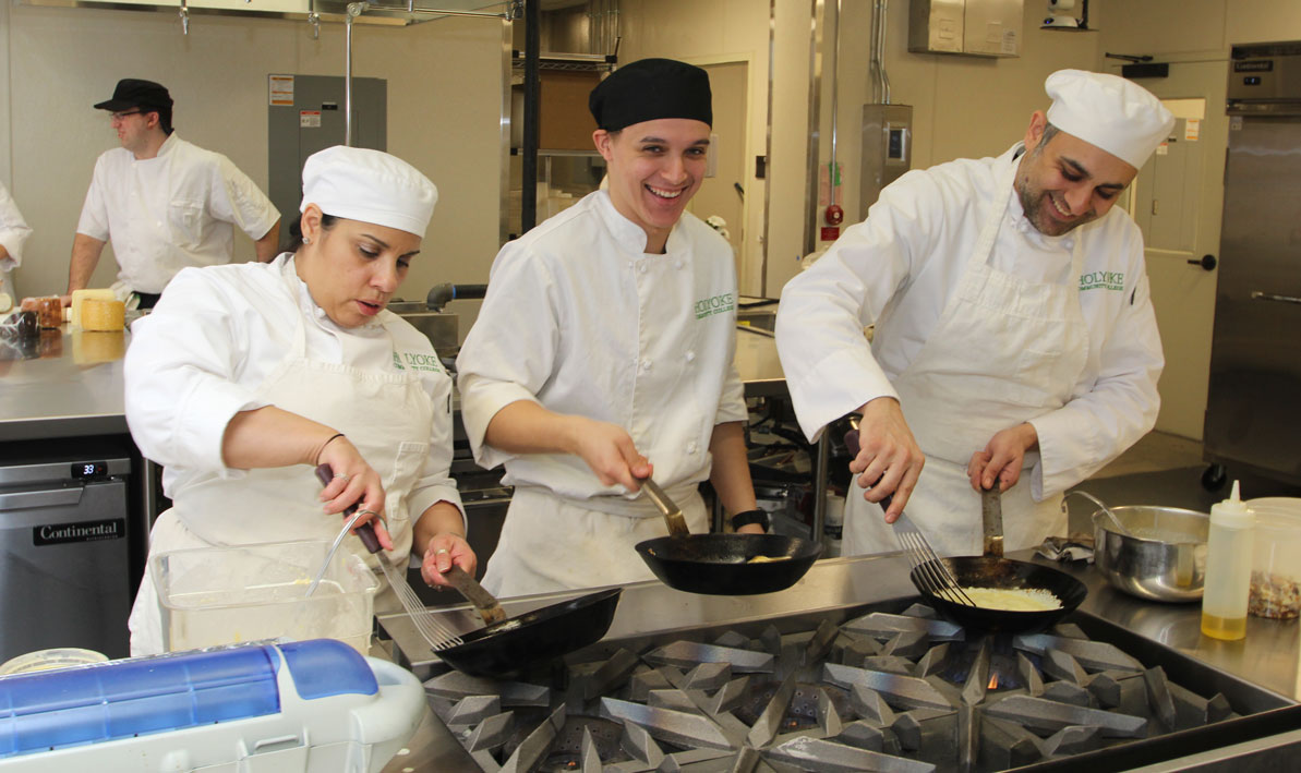 HCC Culinary Arts students prepare a meal at the HCC MGM Culinary Arts Institute