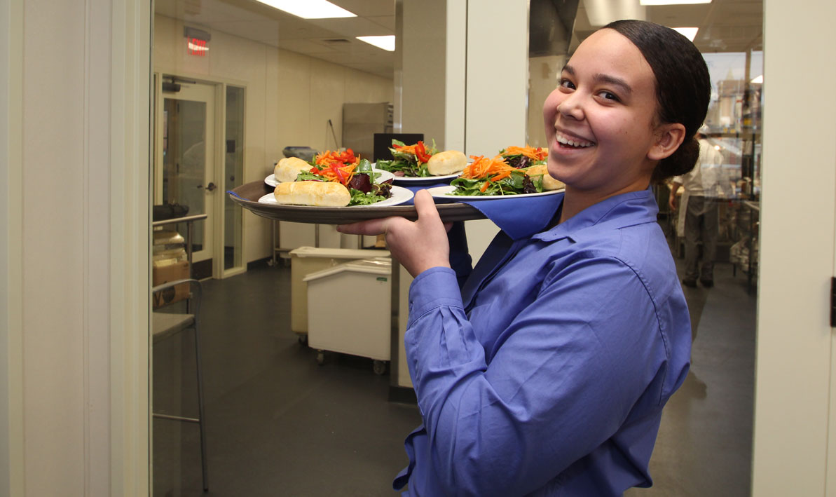 HCC student serving lunch