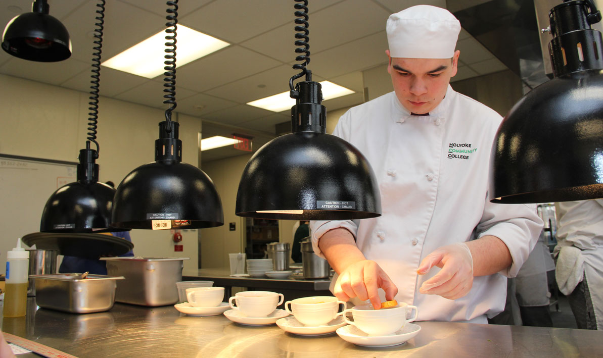 A student prepares soup for lunch at the HCC MGM Culinary Arts institute