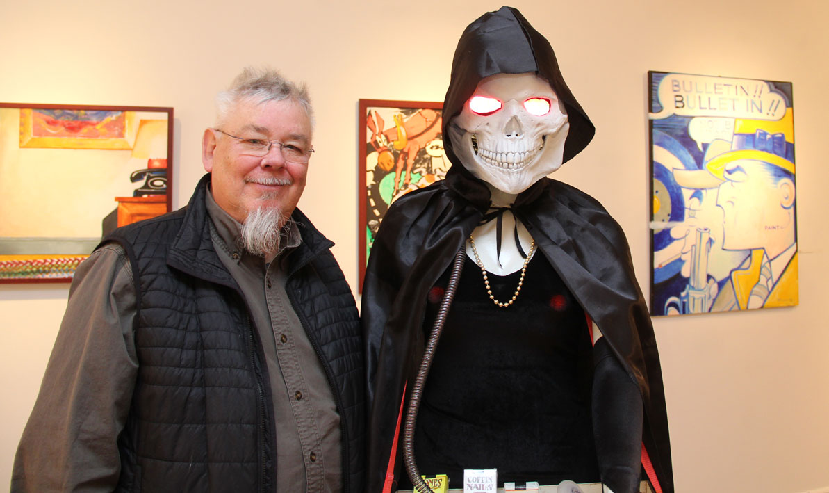 Artist Gary Hallgren, with one of his latest creations.