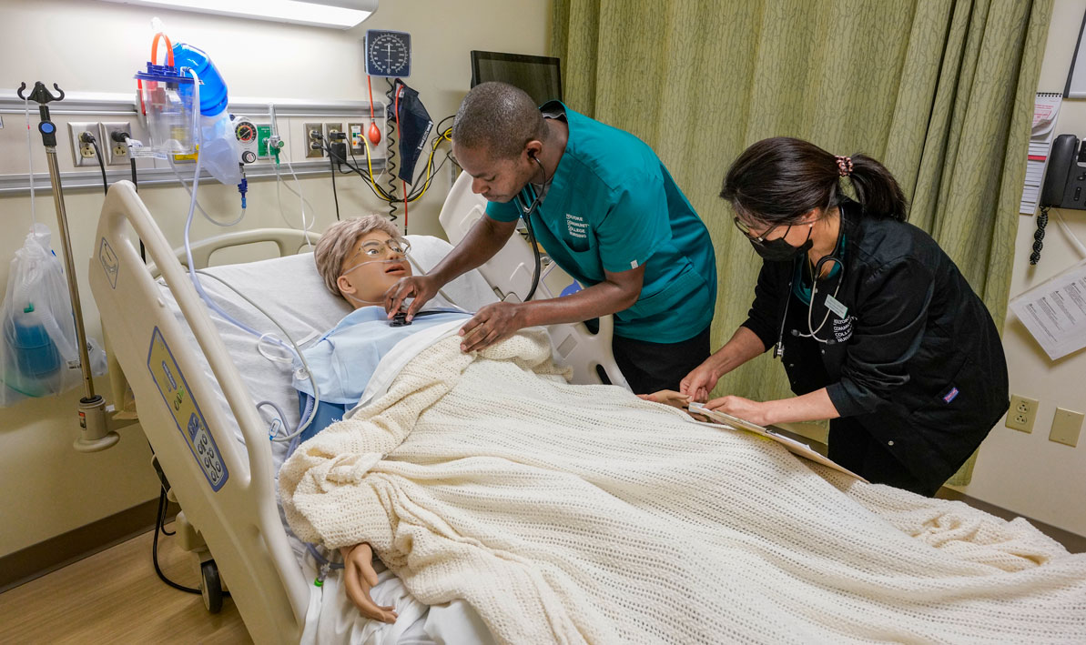 HCC student-nurses practice their craft in the college's Center for Health Education & Simulation. 