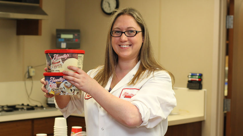 Stephanie Granfield holding two cartons of Friendly's ice cream
