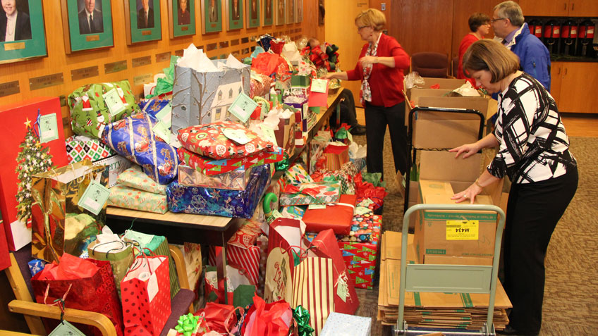 Giving Tree closing pile of gifts