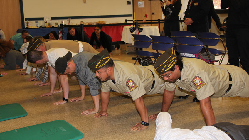 Members of Veterans of Foreign Wars District VII joins students, staff and faculty at HCC for the 22 Pushup Challenge Wednesday during HCC's Veteran Day festivities. 