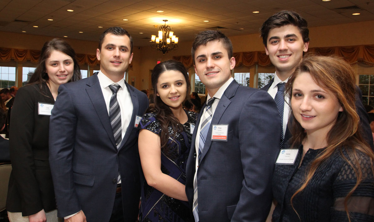 Lisa, Roman, Eva, Filipp, David and Katie Dubchak attend the Grinspoon Entrepreneurship Initiative Award Ceremony & Banquet at the Log Cabin in Holyoke in April.