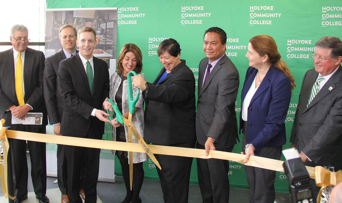 HCC president Christina Royal, Lt. Gov. Karyn Polito and Holyoke mayor Alex Morse cut the gold ribbon during the grand opening celebration of the HCC MGM Culinary Arts Institute. 