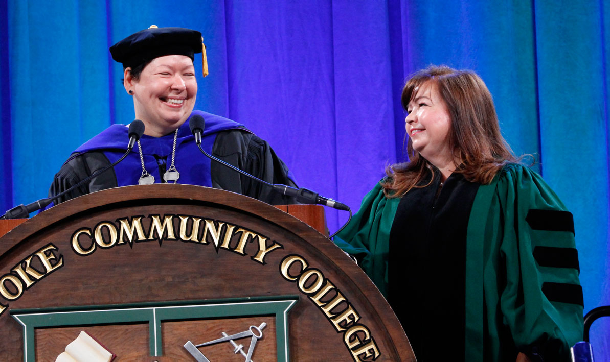 President Christina Royal presents the Distinguished Service Award for 2019 to Lucy Perez. 