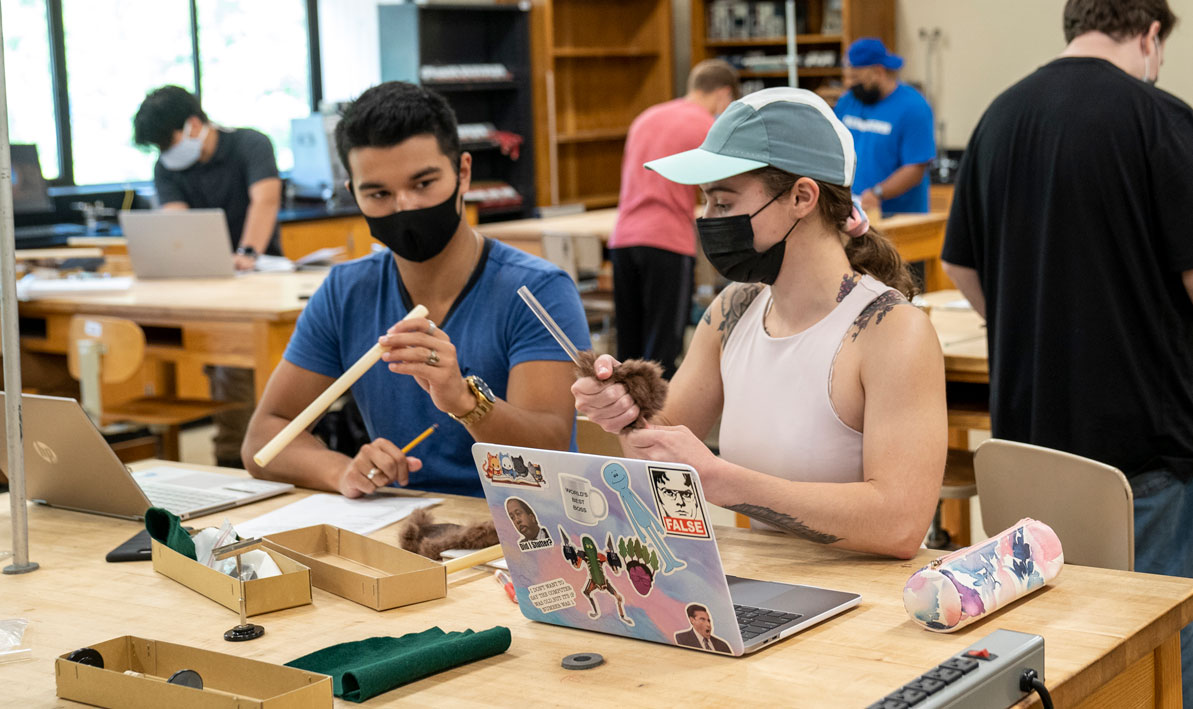 HCC students work on a project during physics lab