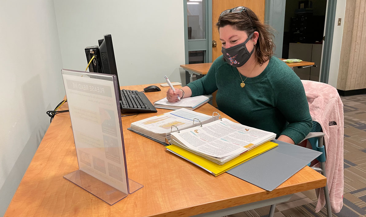 A students studies in the HCC library