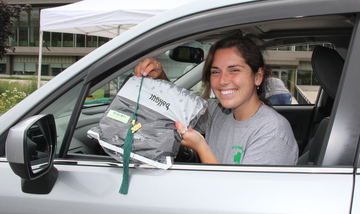 Jessica Cavanaugh '20 drives though the HCC campus to pic up her cap and gown