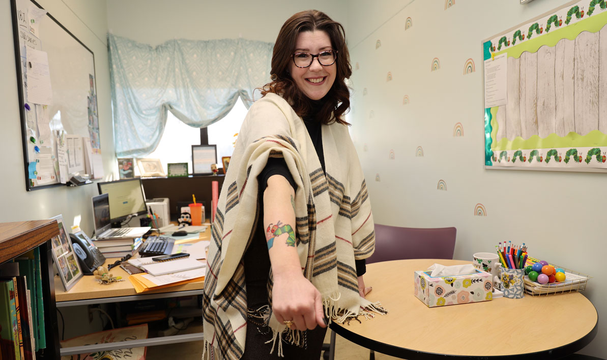 Early education professor Sheila Gould sporting a fresh tattoo chosen by her students. 