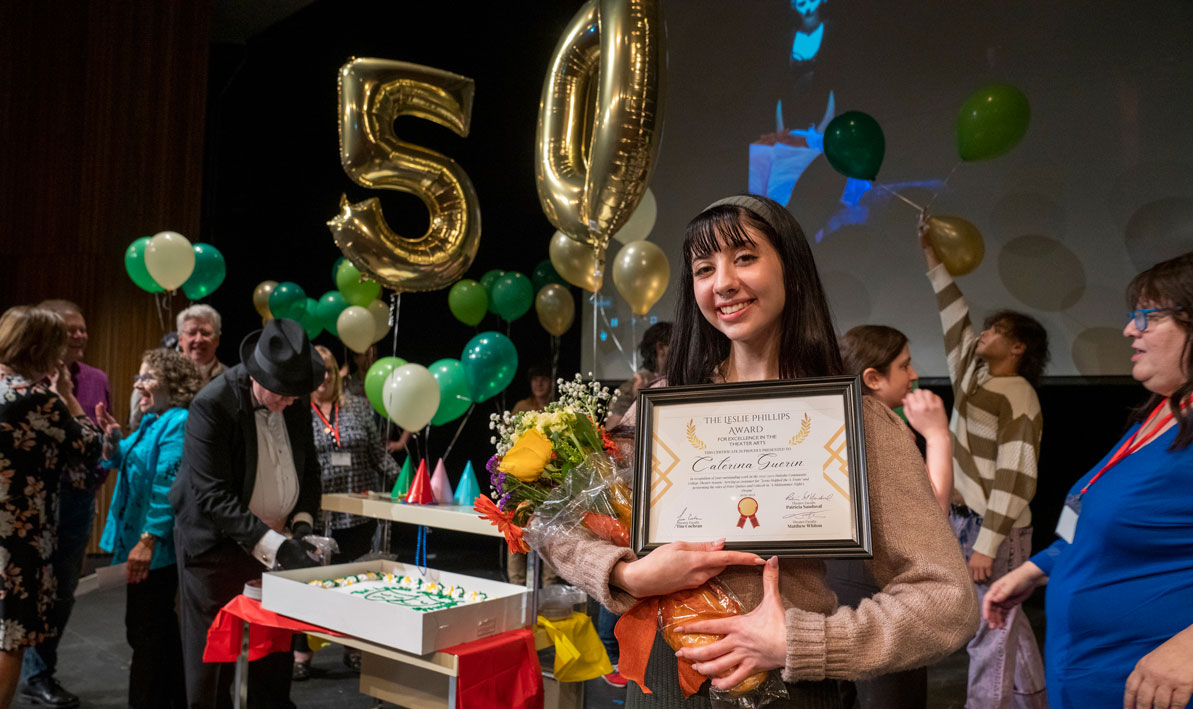 Caterina Guerin holds her theater award