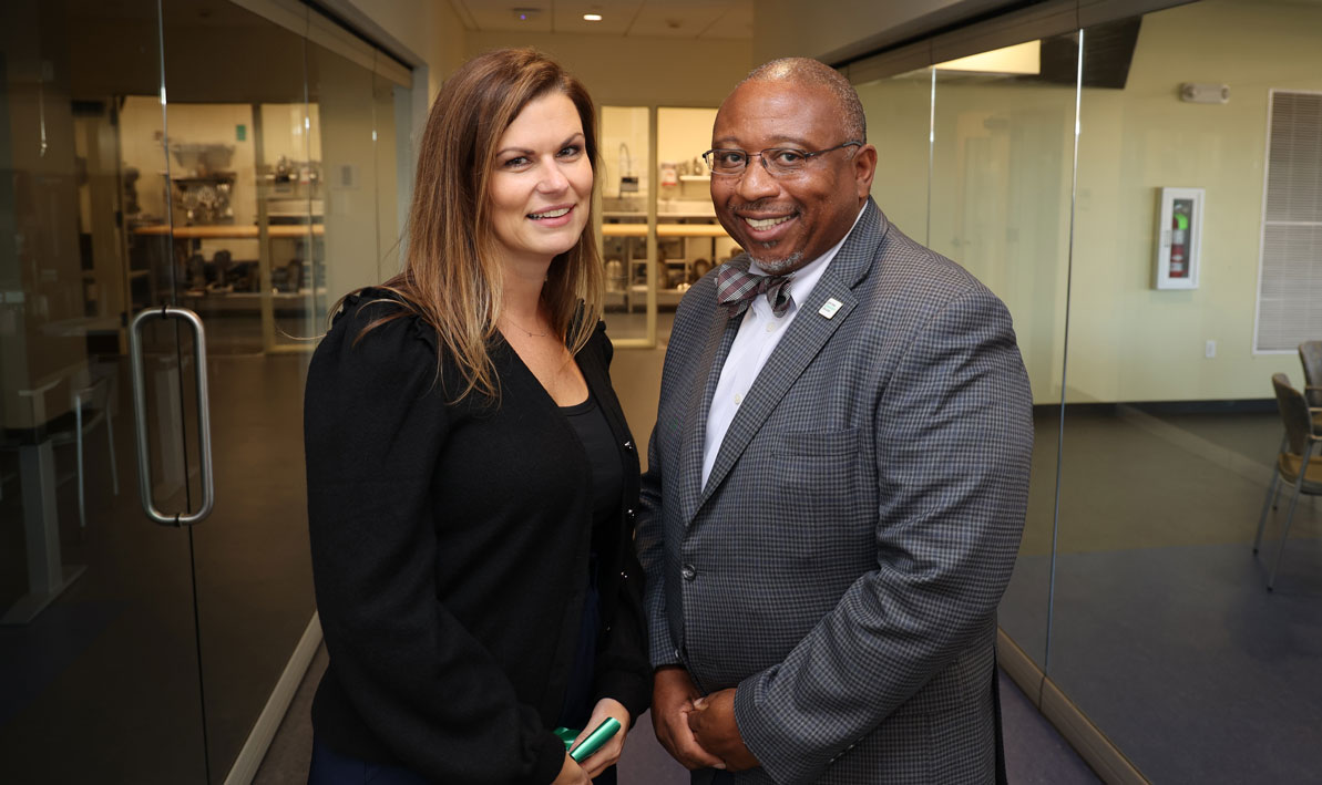 United Way of Pioneer Valley CEO Megan Moynihan and HCC president George Timmons at the  culinary arts institute