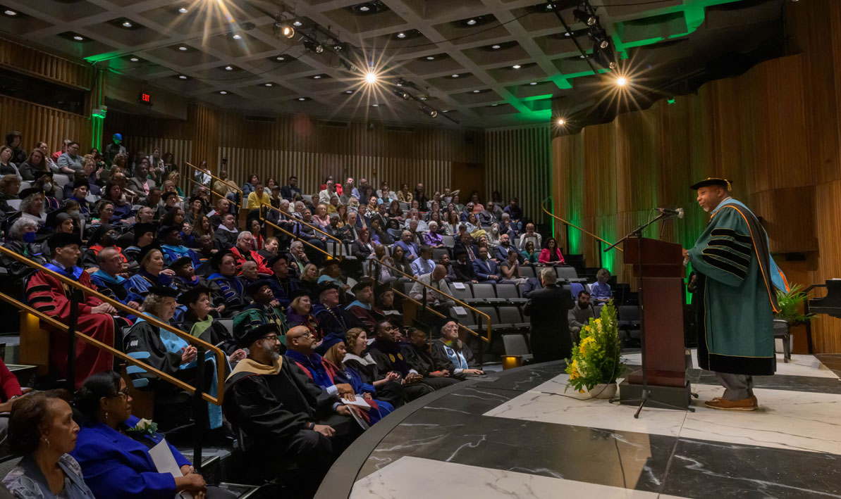 President George Timmons addresses the audience