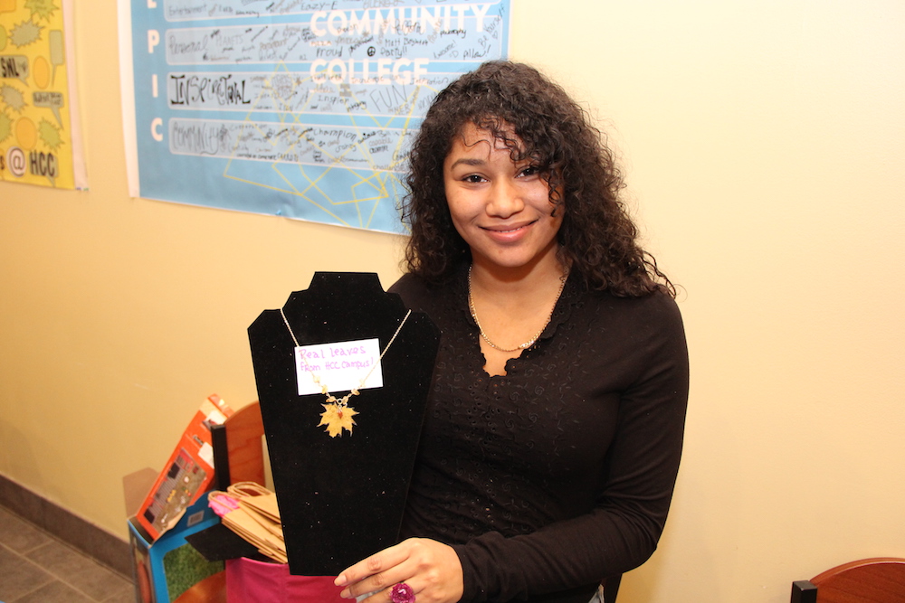 A student entrepreneur with her handmade jewelry