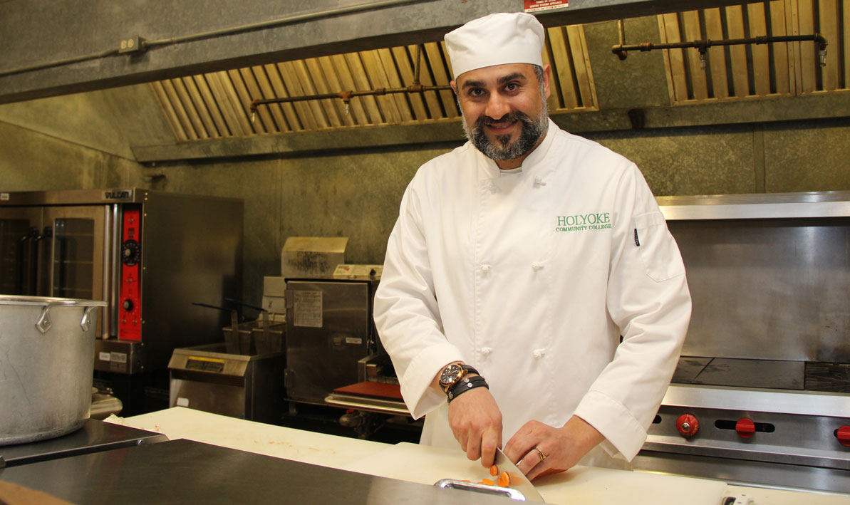 Ben Alimirzaei chopping carrots